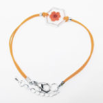 bracelet orange inclusion resine fleur bijou